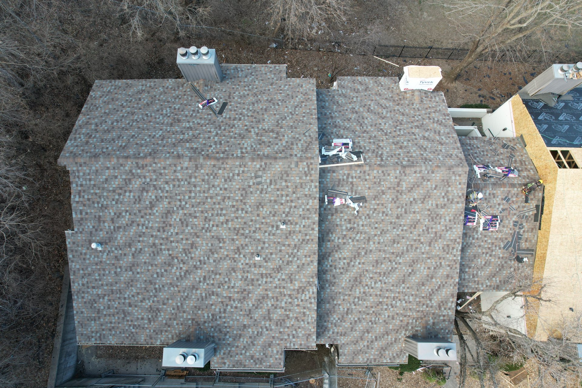 Multi-unit roofing project in progress Kansas City